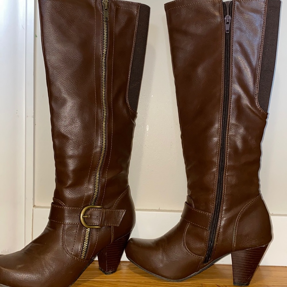 Tall brown zip up boots with heals